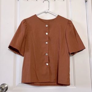 Japanese burnt orange / brown button top